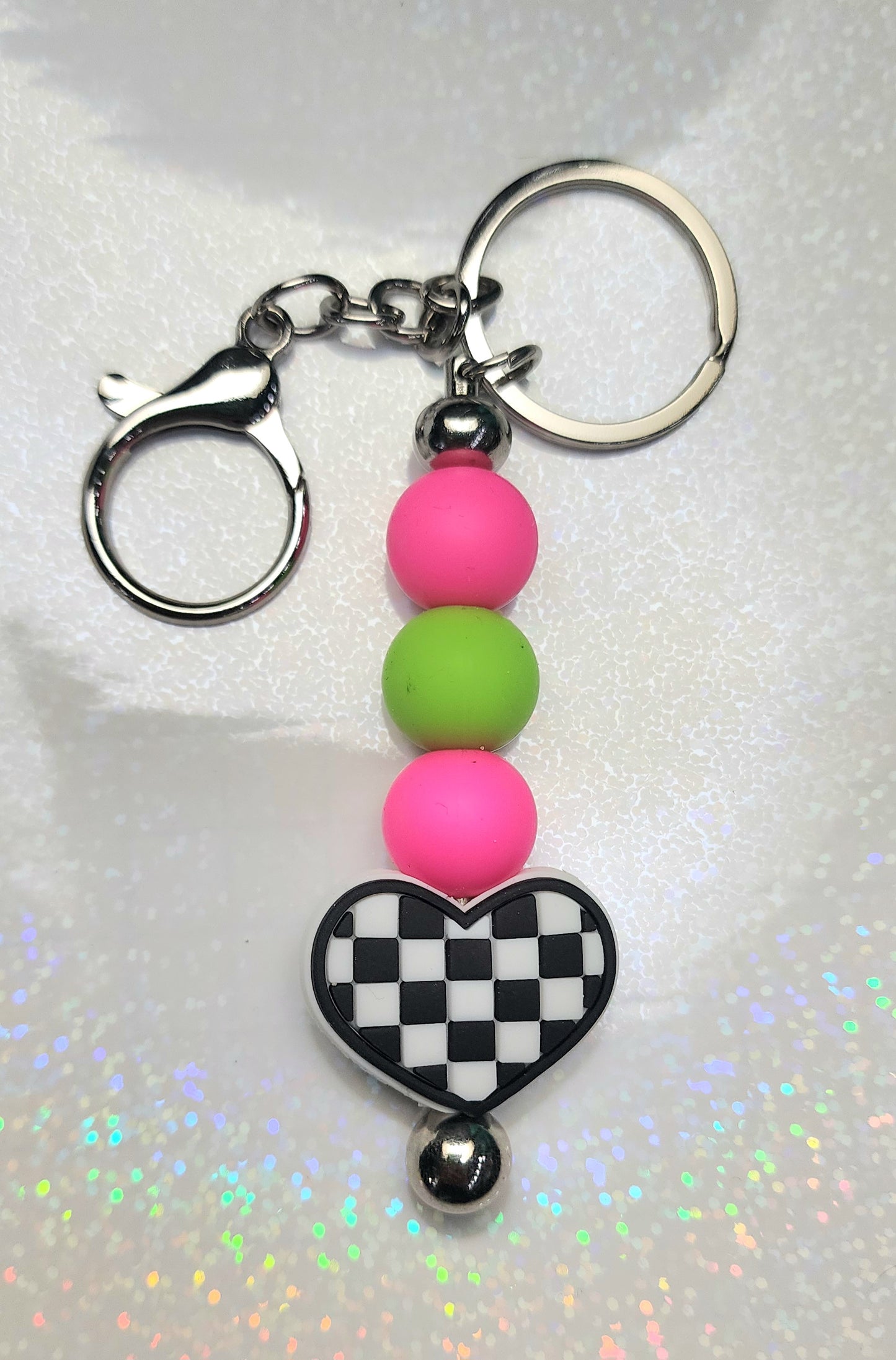 Handmade Checkered Heart Keychain – Black & White with Pink & Green Beaded Charm, Cute AF Keyring