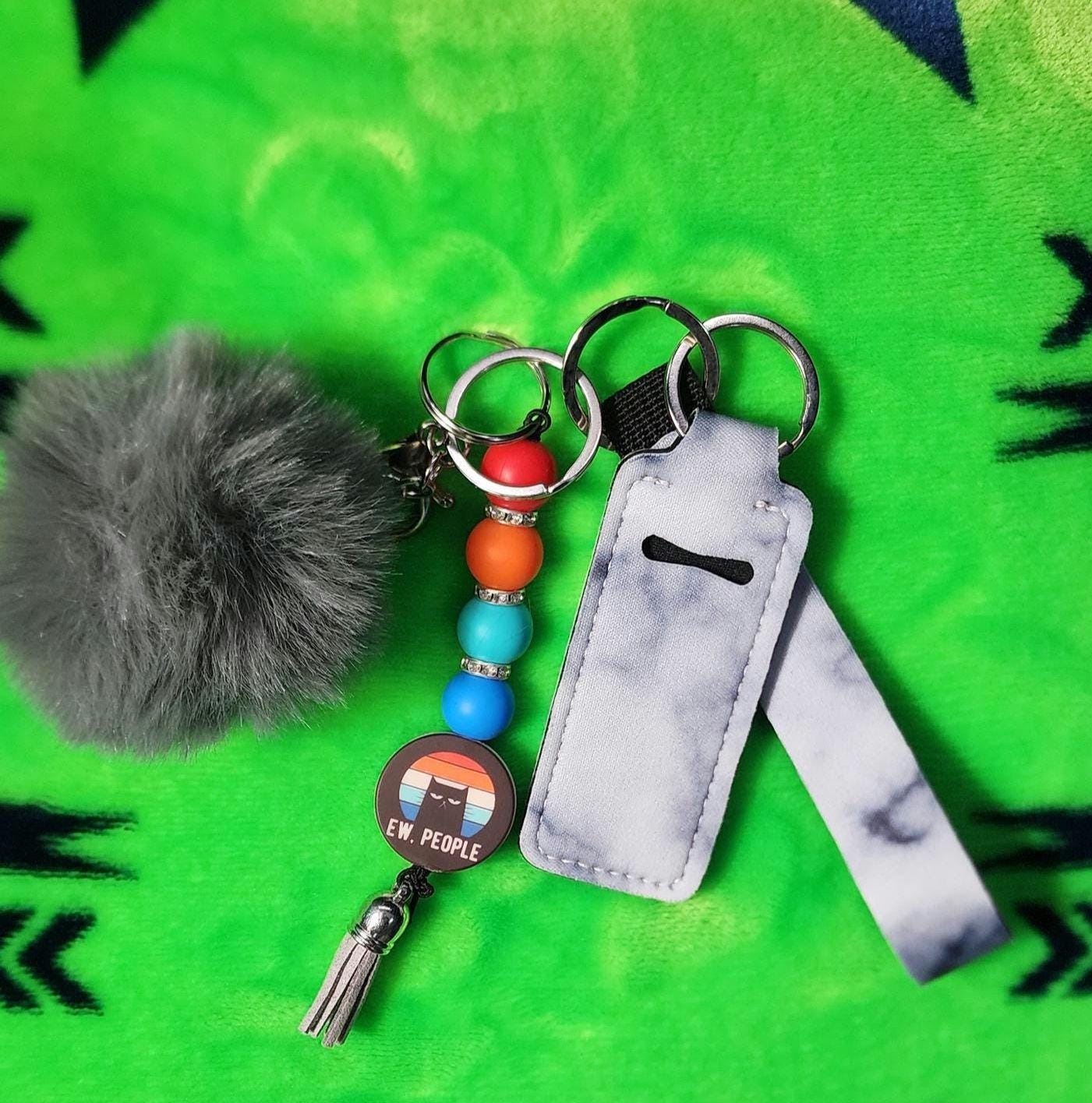 Ew People Cat Keychain Set | Funny Cat Lover Keychain with Pom, Lanyard & Hand Sanitizer Holder | Sassy Anti-Social Energy