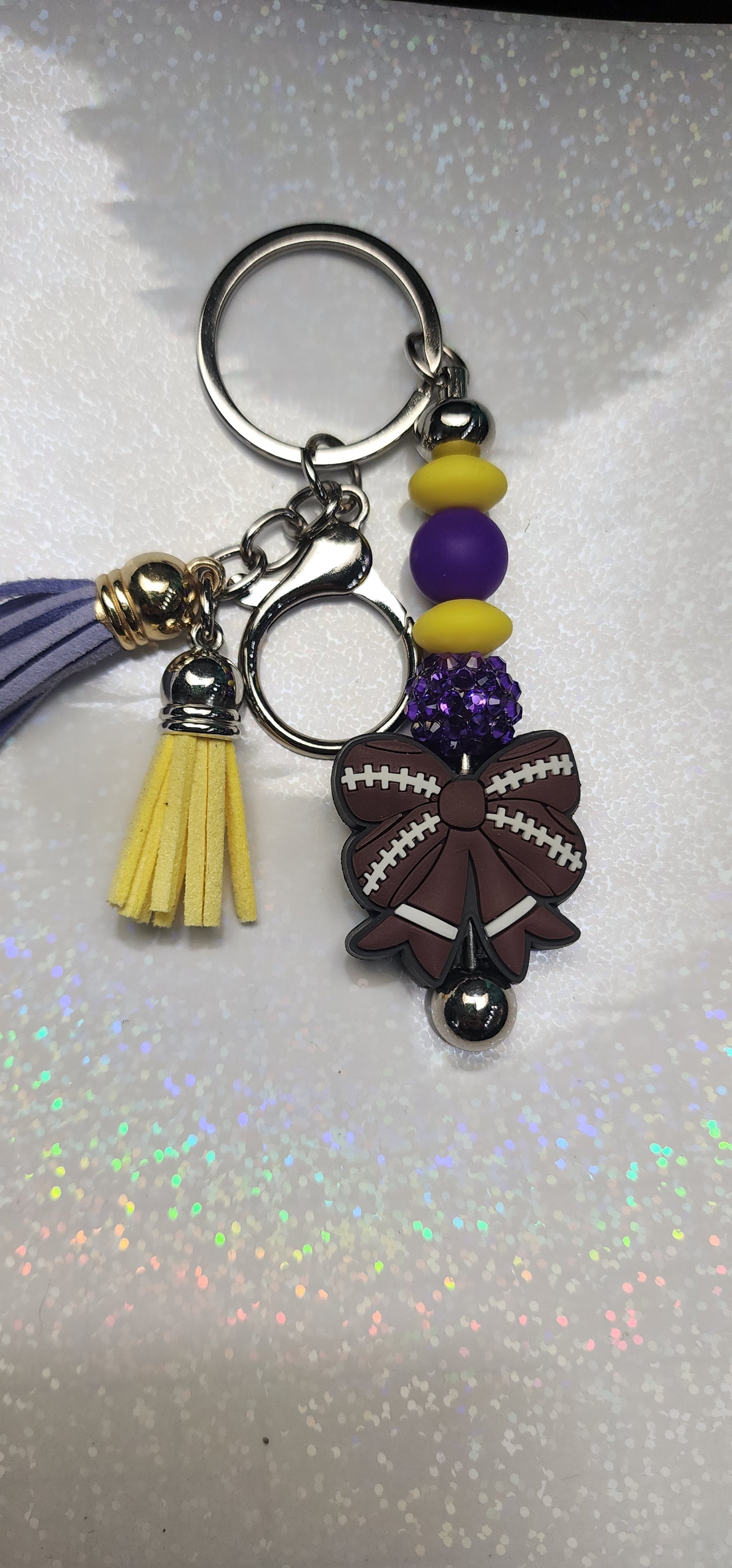 Handmade Beaded Football Bow Keychain – Vikings Colors, Purple & Gold Charm