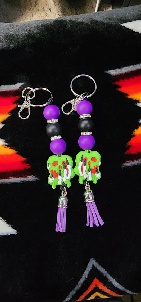 Skull Hand Holding Green Apple Keychain Gothic Horror Keychain | Creepy Cute Spooky Bag Charm | Halloween Skull Hand Accessory Gift for Gothic Aesthetic Lovers