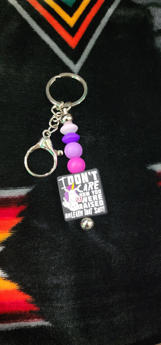 Unicorn Middle Finger Keychain – “I Don’t Care Who Raised You, Unlearn That Sh*t” – Funny Attitude Keychain