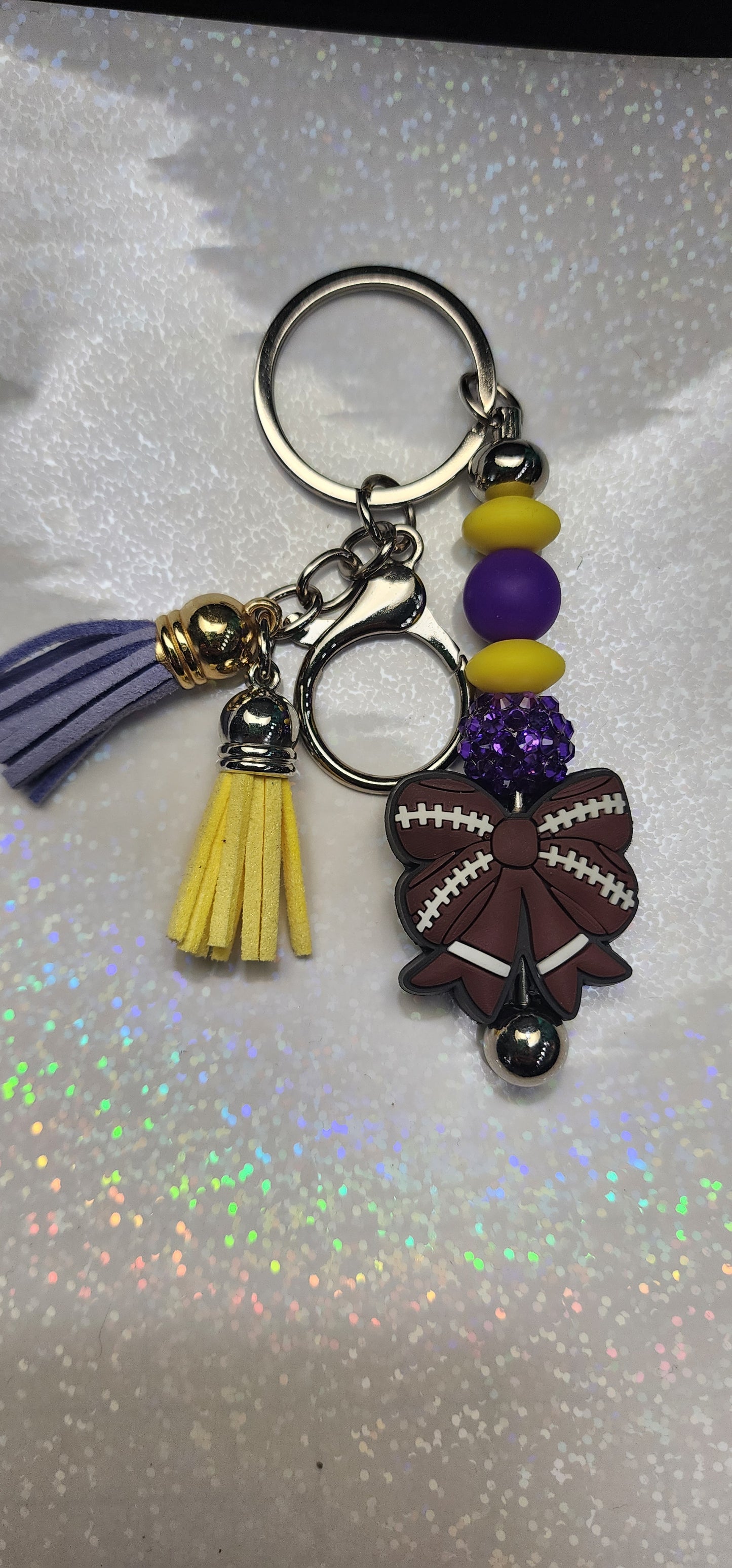 Handmade Beaded Football Bow Keychain – Vikings Colors, Purple & Gold Charm
