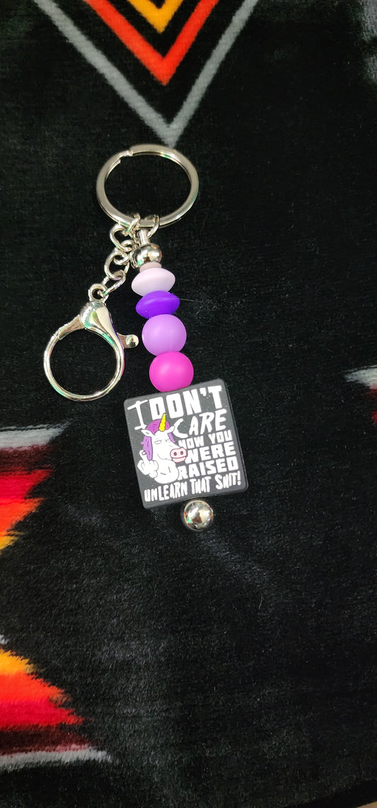 Unicorn Middle Finger Keychain – “I Don’t Care Who Raised You, Unlearn That Sh*t” – Funny Attitude Keychain